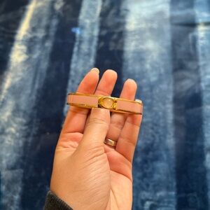 Pink and gold coach bracelet